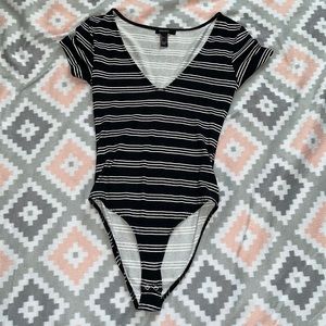 Forever 21 Black and White Body Suit . Size S.